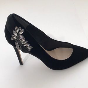 Nina black suede diamond embellished pumps.
